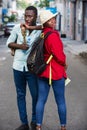 Young couple with lollipop candy