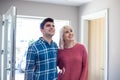 Young Couple Looking Around New Home To Rent Or Buy Together Royalty Free Stock Photo