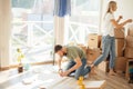Couple looking blueprints of they new house. Planning interior design Royalty Free Stock Photo