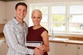 Young Couple Looking At Details For New Home Royalty Free Stock Photo