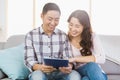 Young couple looking at digital tablet Royalty Free Stock Photo