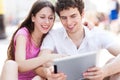 Young couple looking at digital tablet Royalty Free Stock Photo