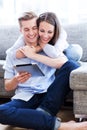 Young couple looking at digital tablet Royalty Free Stock Photo
