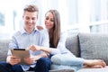 Young couple looking at digital tablet Royalty Free Stock Photo