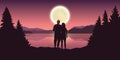 Young couple looks to the full moon at beautiful lake