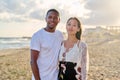 Young couple in love on the beach together. Royalty Free Stock Photo