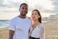 Young couple in love on the beach together. Royalty Free Stock Photo