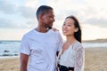 Young couple in love on the beach together. Royalty Free Stock Photo