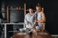 Young couple in love cook healthy food in the kitchen together Royalty Free Stock Photo