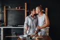 Young couple in love cook healthy food in the kitchen together Royalty Free Stock Photo