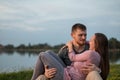 Young couple cuddling outdoors on the beach Royalty Free Stock Photo