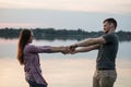 Young couple in love dancing at the beach Royalty Free Stock Photo