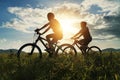 Young Couple in love fun and happy riding mountain bike after covid-19 coronavirus outbreak. End of the coronavirus outbreak. Royalty Free Stock Photo