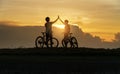 Young Couple in love fun and happy riding mountain bike after covid-19 coronavirus outbreak. End of the coronavirus outbreak. Royalty Free Stock Photo