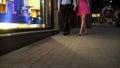 Young couple in love going home late at night after successful date, stroll Royalty Free Stock Photo