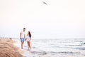 Young couple in love have fun walking on the beach and laughing. Royalty Free Stock Photo