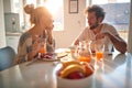 A young couple in love having romantic moments while having a breakfast at home. Relationship, love, together, breakfast Royalty Free Stock Photo