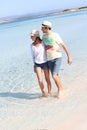 Young couple in love on holdays walking in seawater