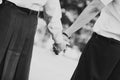 Young couple in love holding hands, monochrome black and white, memory of old day concept