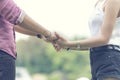 Young couple in love holding hands together with sweet time moment romance love. Romantic relation two people boy friend and girl