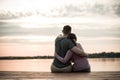 Young couple in love hugging at the beach Royalty Free Stock Photo