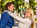 Young couple in love hugging and flirting in autumn park. Royalty Free Stock Photo