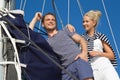 Young couple in love makes holiday on a sailboat