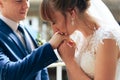 Young couple in love newlyweds exchange gold wedding rings 1 Royalty Free Stock Photo