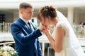 Young couple in love newlyweds exchange gold wedding rings 1 Royalty Free Stock Photo