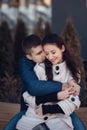 Young couple in love outdoor. They are smiling and looking at each other Royalty Free Stock Photo