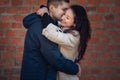 Young couple in love outdoor. They are smiling and looking at each other Royalty Free Stock Photo