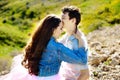 Young couple in love outdoor. Stunning sensual outdoor portrait of young stylish fashion couple posing in summer in Royalty Free Stock Photo