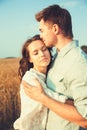 Young couple in love outdoor.Stunning sensual outdoor portrait of young stylish fashion couple posing in summer in field.Happy Royalty Free Stock Photo