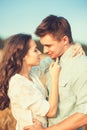 Young couple in love outdoor.Stunning sensual outdoor portrait of young stylish fashion couple posing in summer in field.Happy Royalty Free Stock Photo