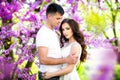 Young couple in love outdoor.Stunning sensual outdoor portrait of young stylish fashion couple posing in summer in field Royalty Free Stock Photo