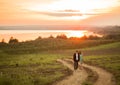 A Young couple in love outdoor at the sunset Royalty Free Stock Photo