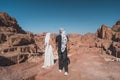 Young couple in love standing on top of Petra ruin and ancient city in Wadi Musa, Jordan, Arab
