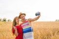 Young couple in love taking selfie