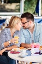 Young couple in love, tenderly touching with foreheads