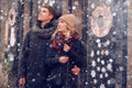 Young couple in love couple travels on St. Valentine`s Day. Holidays in Europe. Warm clothes, hat. scarf, nice atmosphere. Winter,