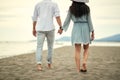 Young couple in love walking on the beach Royalty Free Stock Photo