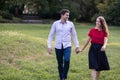 Young couple in love walking in the park Royalty Free Stock Photo