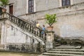 ROMA, ITALY - AUGUST 2018: Young couple in love walks the antique stairs at Villa d`Este in Tivoli