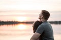Young couple in love watching the summer sky together Royalty Free Stock Photo