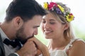 young couple in love Wedding Bride and groom kissing hand in the park. Newlyweds. Closeup portrait of a beautiful having a Royalty Free Stock Photo