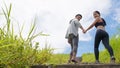 Young couple, lover holding hand step up the stair outdoor for a jogging, healthy and exercise concept