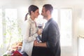 Young couple of lovers celebrating at home drinking wine Royalty Free Stock Photo