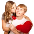 Young couple of lovers. Man presents flower. Valentine day Royalty Free Stock Photo
