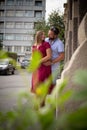 Young couple loving each other. Man and woman vetoed on a city street