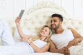 Young Couple Lying Bed Take Selfie Photo, Happy Smile Hispanic Man And Woman